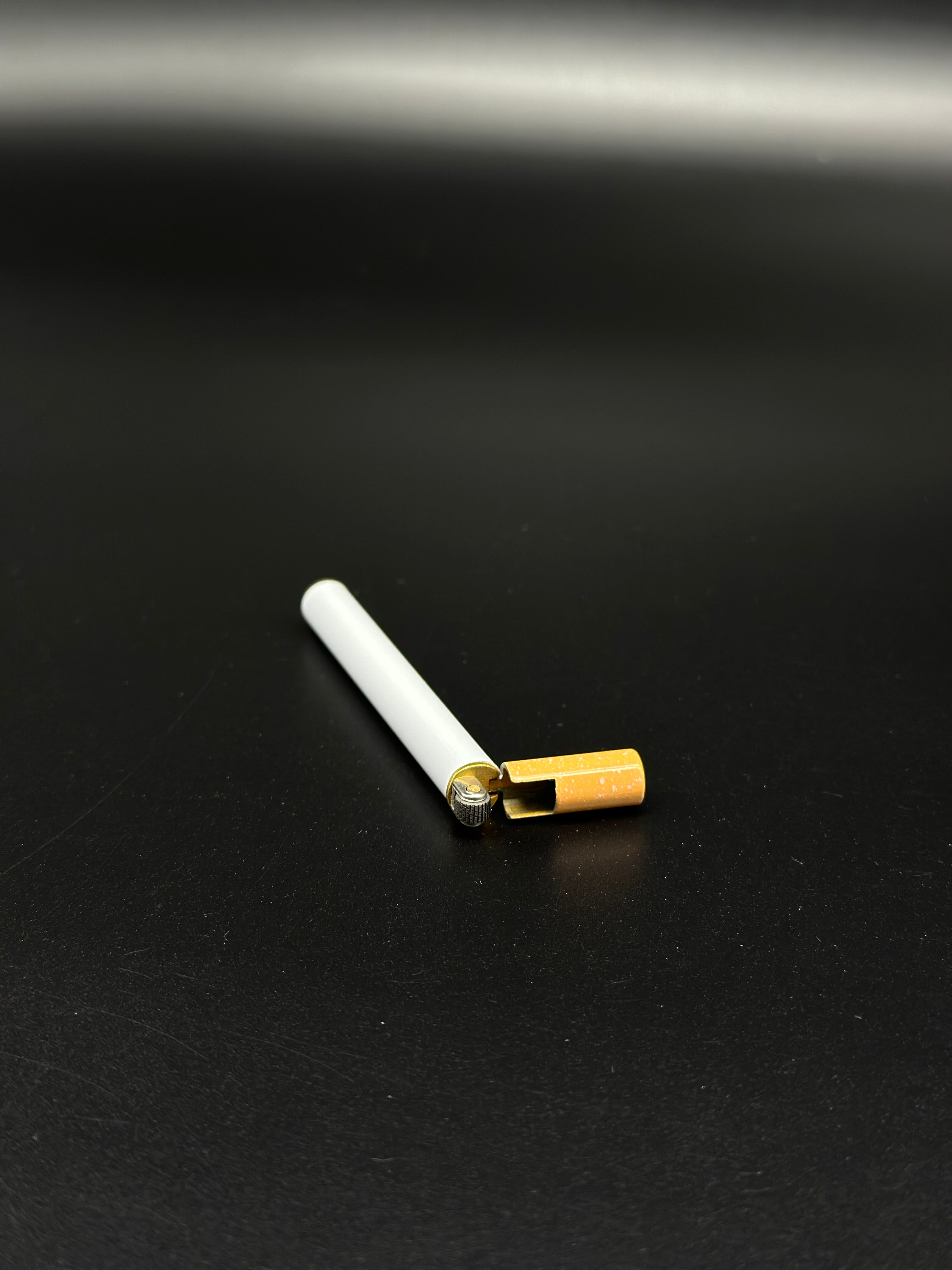 Creative Cigarette Lighter Mini Gas Lighter. Comes without gas